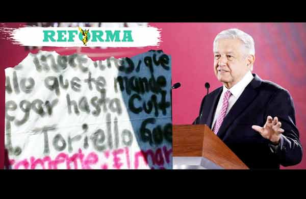 AMLO cuestiona al Reforma por difundir manta amenazante con dirección de su casa